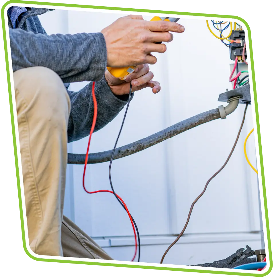 All Airs Home Services electrician working on home electrical panel