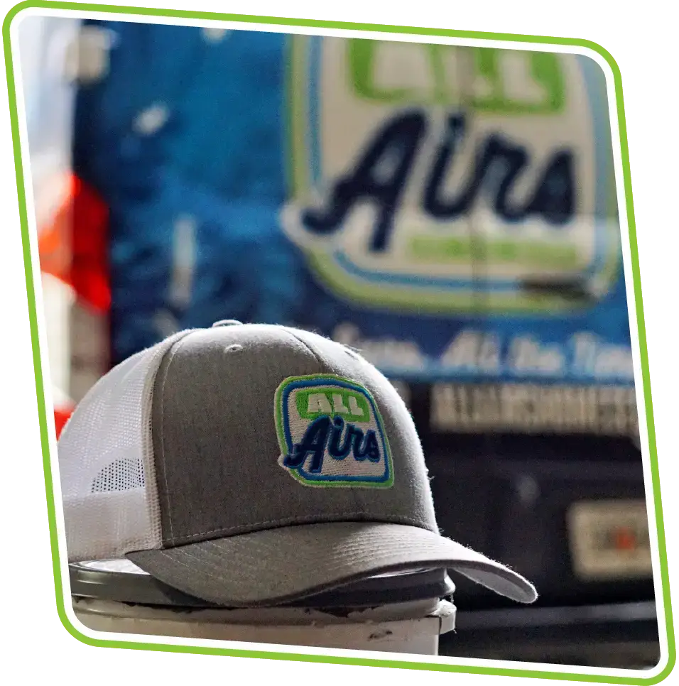 Closeup of All Airs hat and service vehicle in Ball Ground, GA.