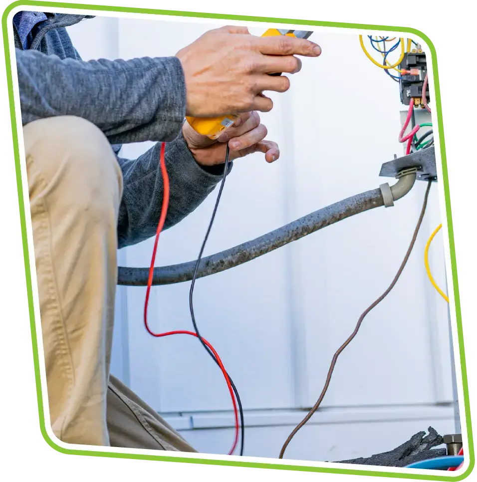 All Airs Home Services technician working on home electrical panel for HVAC unit in Georgia.